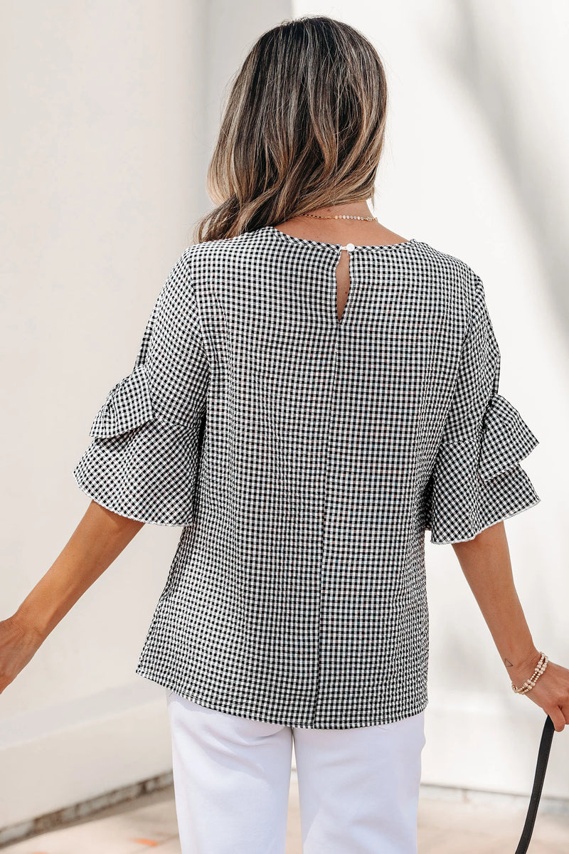 Load image into Gallery viewer, DLLS632 - Ladies Black Plaid Bow Ruffled Half Sleeve Round Neck Blouse
