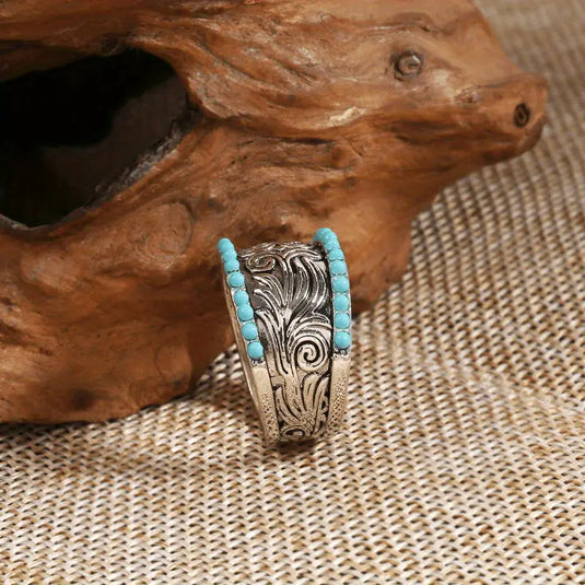 TMRG8 - Carved Ring With Synthetic Turquoise Stones