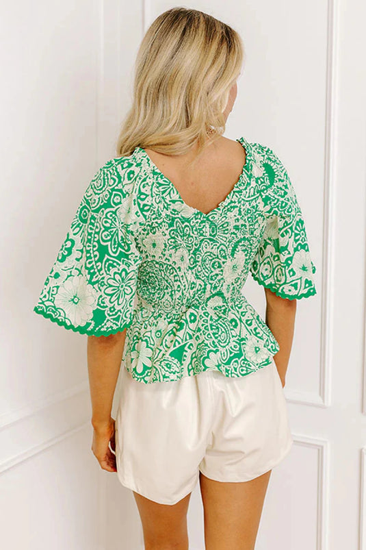 DLLS934 - Ladies Green Flirty Floral Smocked V Neck Blouse