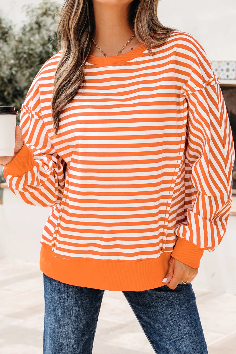 Load image into Gallery viewer, DLLS422 - Ladies Orange Stripe Exposed Seam Drop Shoulder Casual Pullover Top
