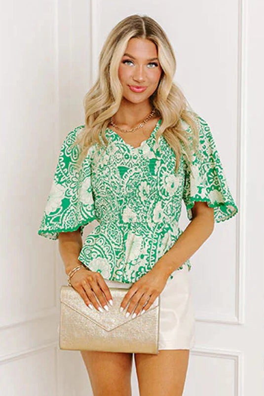 DLLS934 - Ladies Green Flirty Floral Smocked V Neck Blouse