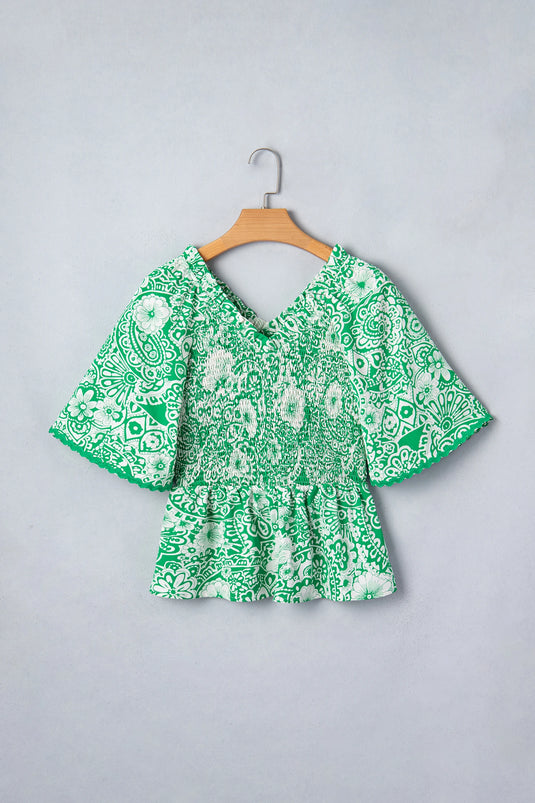 DLLS934 - Ladies Green Flirty Floral Smocked V Neck Blouse