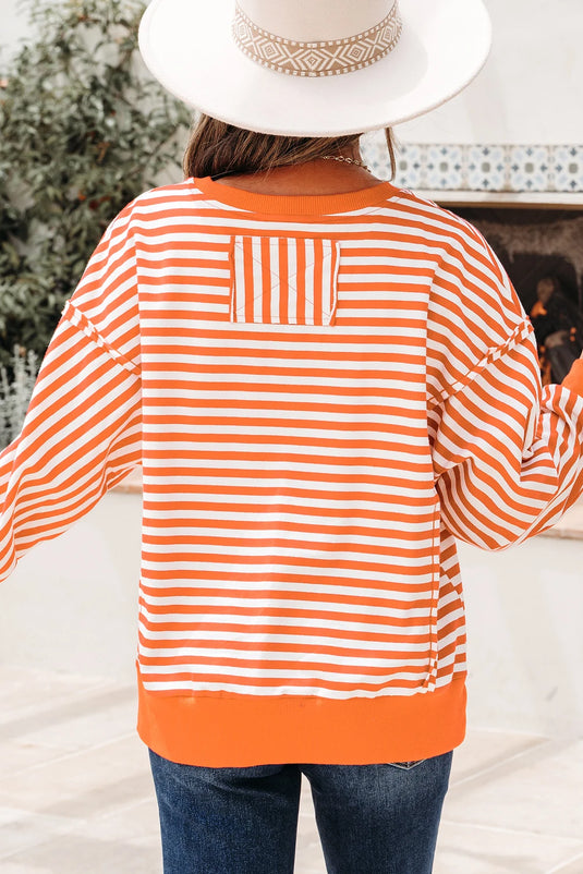 DLLS422 - Ladies Orange Stripe Exposed Seam Drop Shoulder Casual Pullover Top