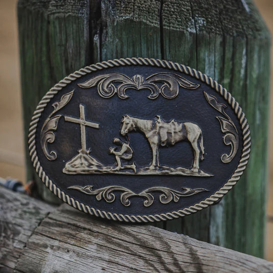 668 - Oval Praying Cowboy with Rope Edge Buckle