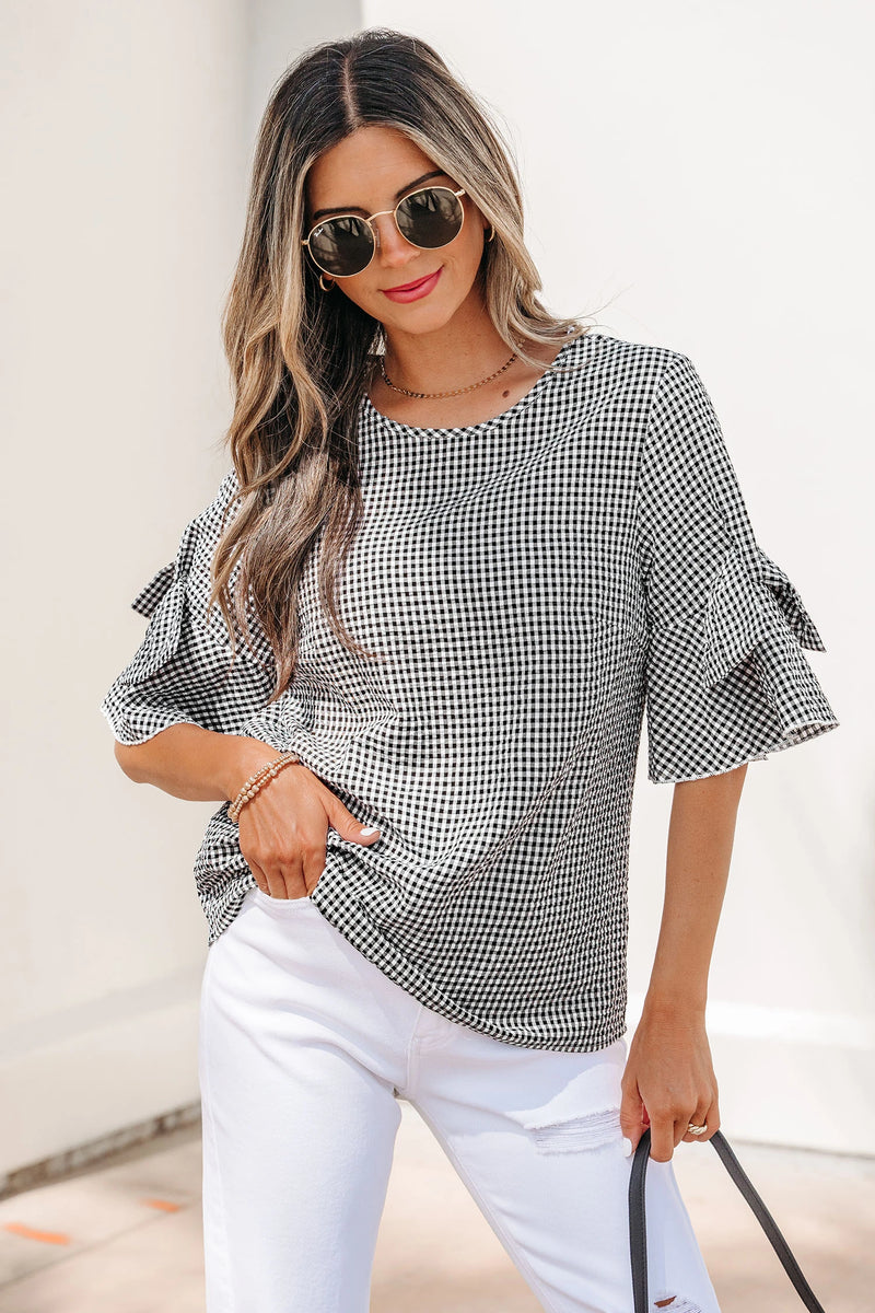 Load image into Gallery viewer, DLLS632 - Ladies Black Plaid Bow Ruffled Half Sleeve Round Neck Blouse
