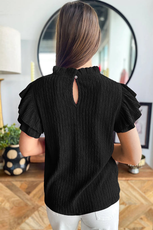 DLLS693 - Ladies Black Solid Color Textured Ruffle Trim Short Sleeve Blouse