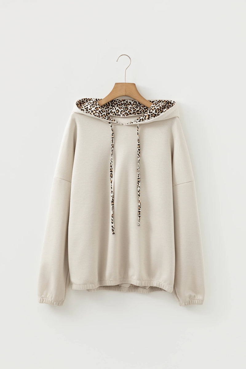 Load image into Gallery viewer, DLLS406 - Ladies Jet Stream Leopard Contrast Drawstring Hood Drop Shoulder Loose Top
