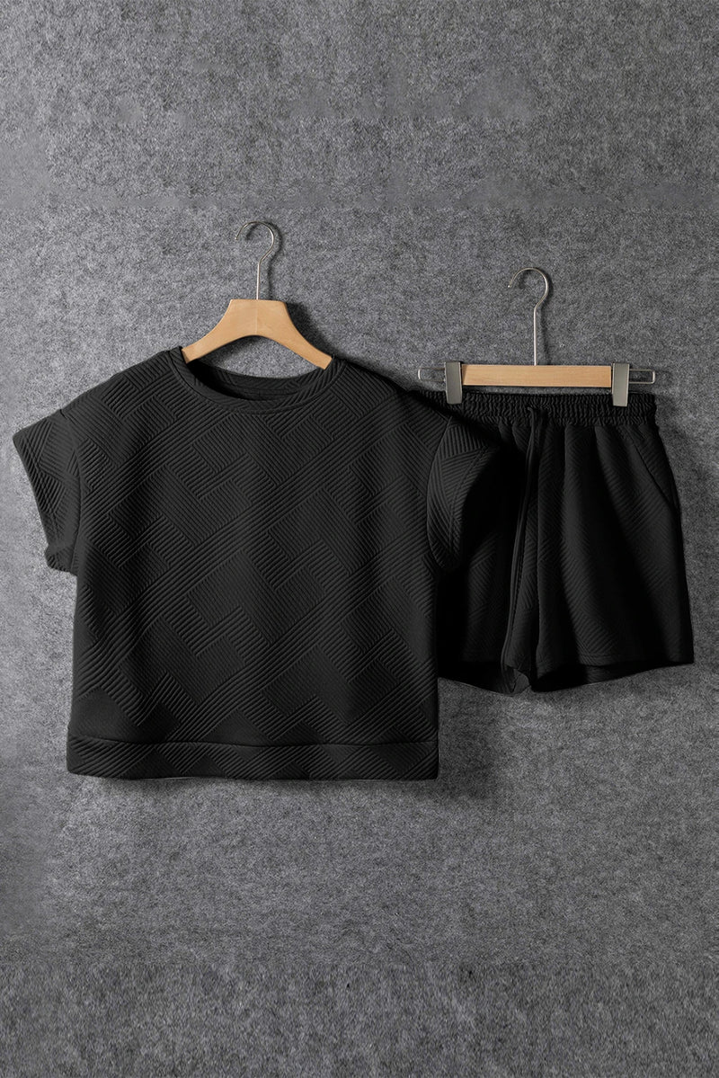 Load image into Gallery viewer, DLLS490 - Ladies Black Textured Short Sleeve Top and Shorts Set
