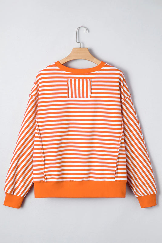 DLLS422 - Ladies Orange Stripe Exposed Seam Drop Shoulder Casual Pullover Top