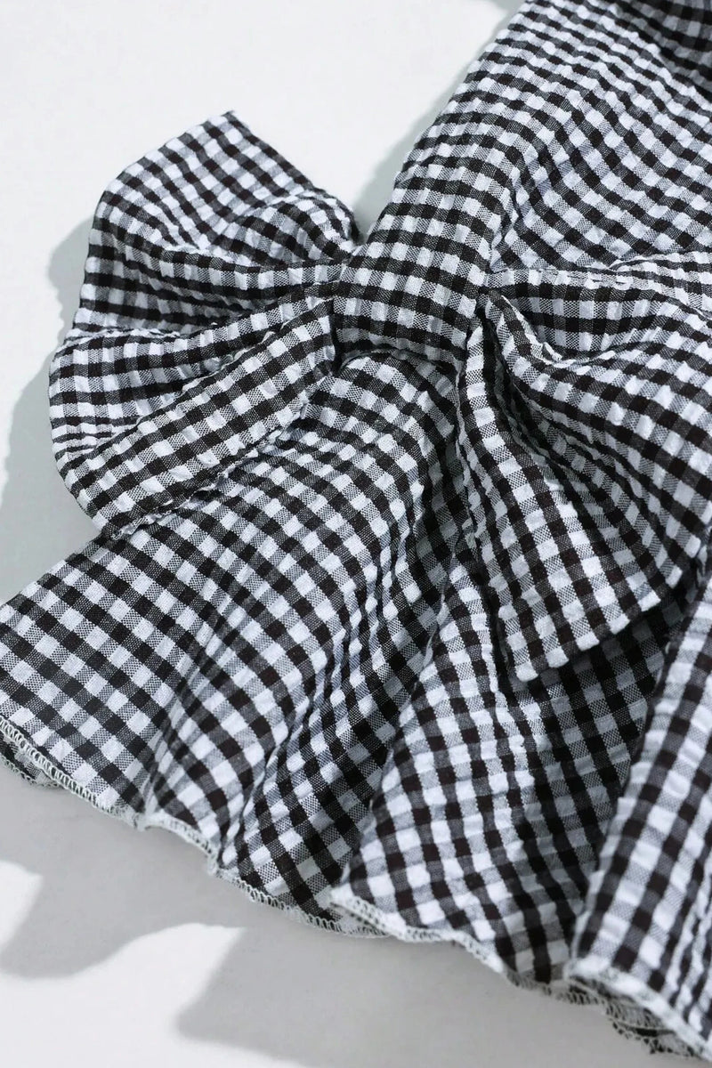 Load image into Gallery viewer, DLLS632 - Ladies Black Plaid Bow Ruffled Half Sleeve Round Neck Blouse
