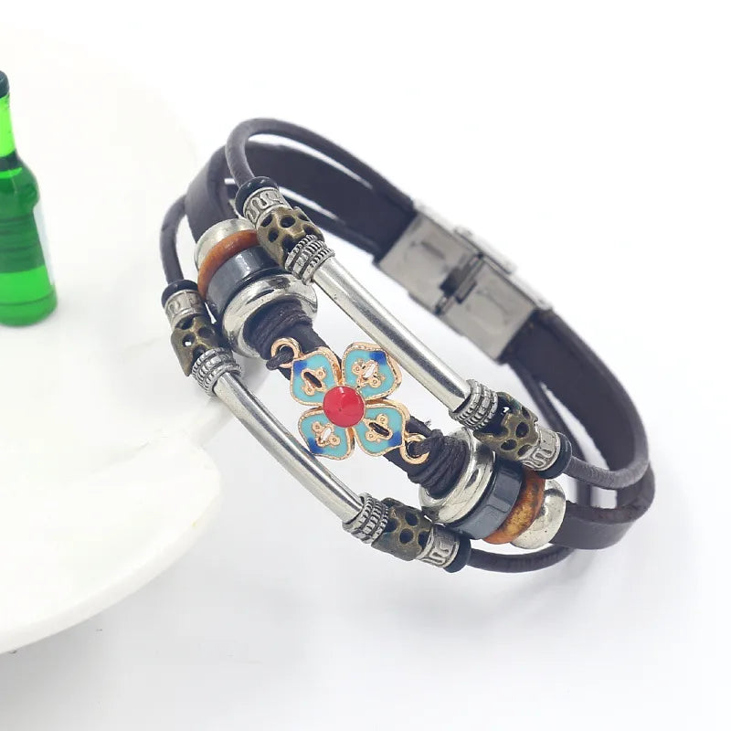 Load image into Gallery viewer, NIHBC22 - One Piece Black Multi Layer Bracelet With Floral Medallion
