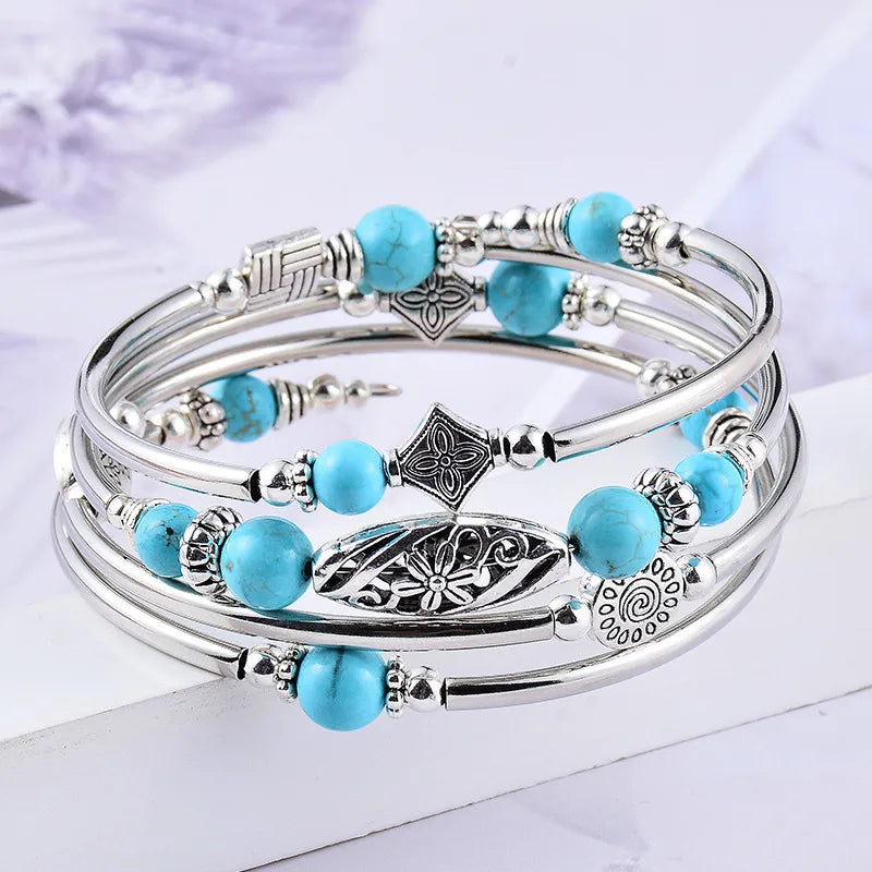 Load image into Gallery viewer, NIHBC48 - Cylindrical Metal Bracelet w/ Turquoise Beads
