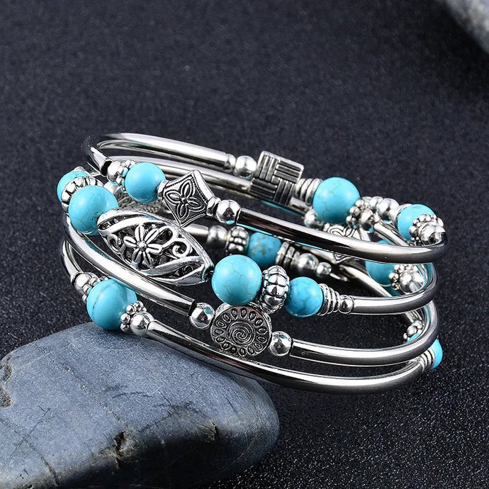 NIHBC48 - Cylindrical Metal Bracelet w/ Turquoise Beads