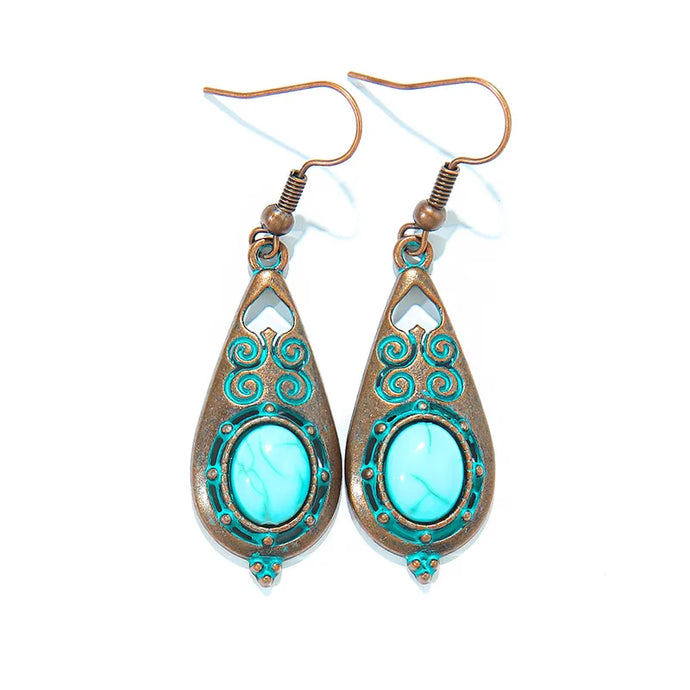 NIHER53 - Distressed Metal Earrings With Turquoise Inlay