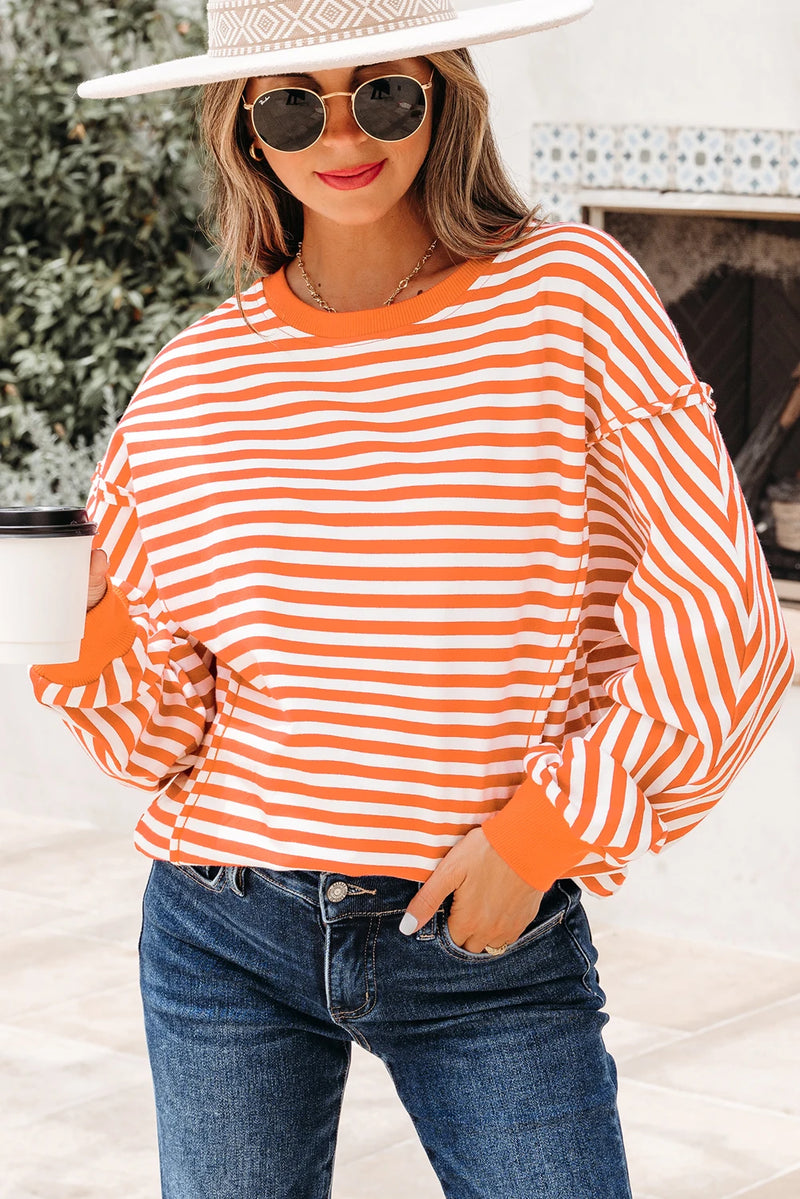 Load image into Gallery viewer, DLLS422 - Ladies Orange Stripe Exposed Seam Drop Shoulder Casual Pullover Top
