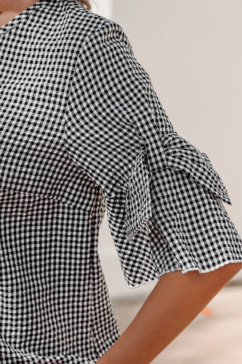 Load image into Gallery viewer, DLLS632 - Ladies Black Plaid Bow Ruffled Half Sleeve Round Neck Blouse

