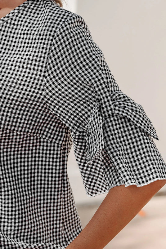 DLLS632 - Ladies Black Plaid Bow Ruffled Half Sleeve Round Neck Blouse