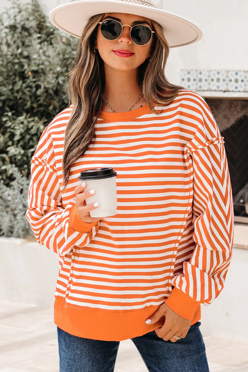 Load image into Gallery viewer, DLLS422 - Ladies Orange Stripe Exposed Seam Drop Shoulder Casual Pullover Top
