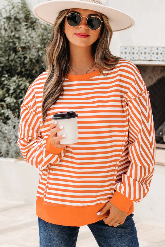 DLLS422 - Ladies Orange Stripe Exposed Seam Drop Shoulder Casual Pullover Top