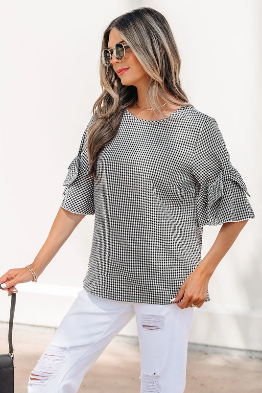 DLLS632 - Ladies Black Plaid Bow Ruffled Half Sleeve Round Neck Blouse