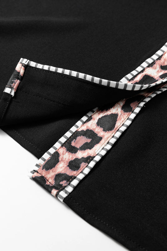 DLLS461 - Ladies Black V Neck Short Puff Sleeve Leopard Trim Button Down Shirt