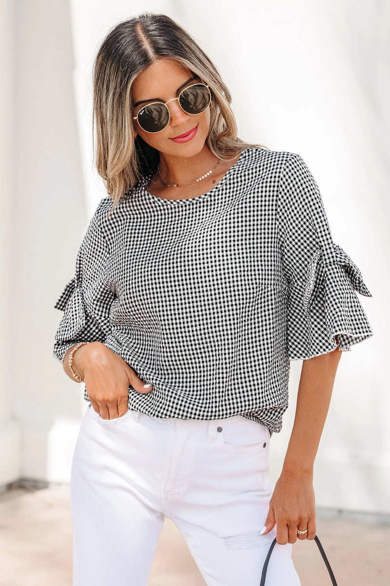 Load image into Gallery viewer, DLLS632 - Ladies Black Plaid Bow Ruffled Half Sleeve Round Neck Blouse
