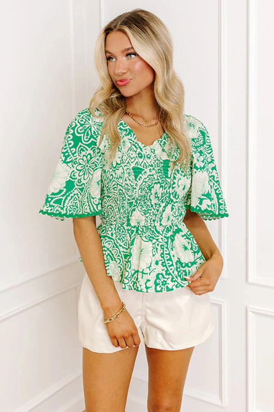 DLLS934 - Ladies Green Flirty Floral Smocked V Neck Blouse