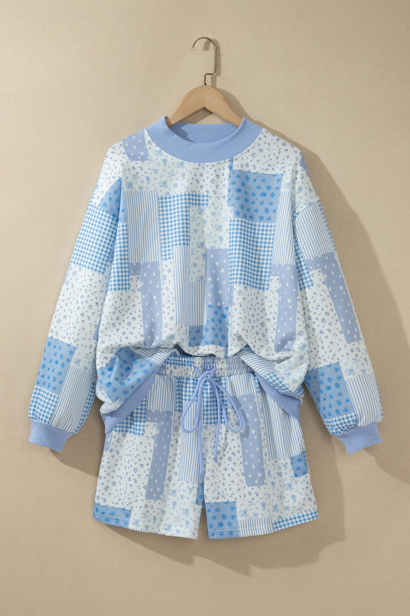Load image into Gallery viewer, DLLS1050 - Ladies Sky Blue Patchwork Floral Print Baggy Pullover Drawstring Shorts Set
