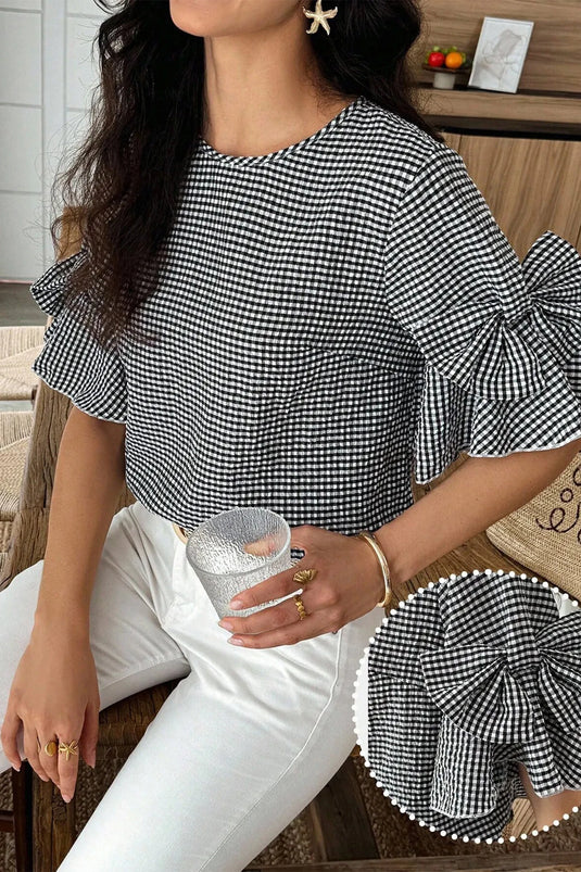 DLLS632 - Ladies Black Plaid Bow Ruffled Half Sleeve Round Neck Blouse