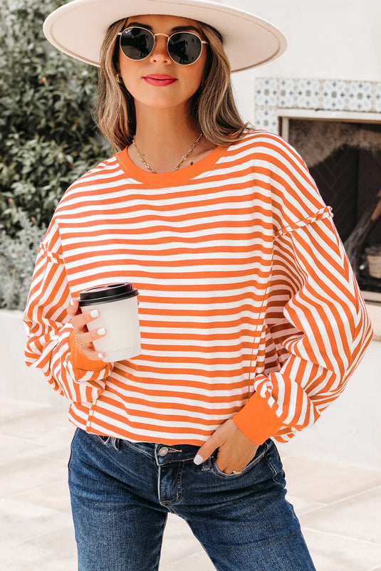 DLLS422 - Ladies Orange Stripe Exposed Seam Drop Shoulder Casual Pullover Top