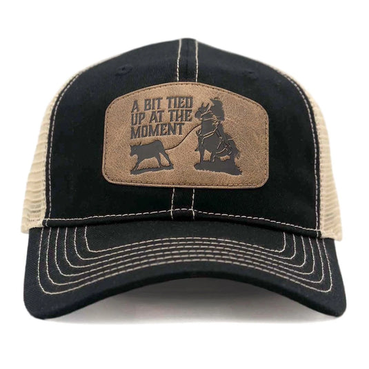 CAP-115-B - Black "A Bit Tied Up At The Moment" Trucker Cap